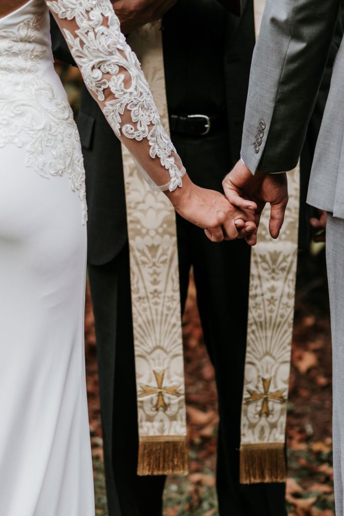 wedding couple holding hands